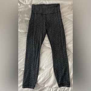 Athleta ultimate stash pocket textured 7/8 tight legging. Size XS.